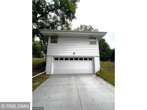 Garage on the south side of the house - and a NEW concrete driveway!
