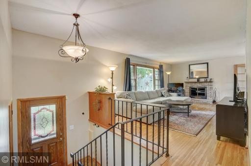 Head up the stairs and walk right into the living room