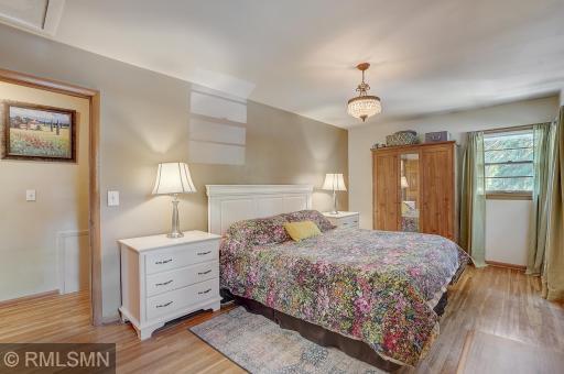 King size bed, large wardrobe, two end tables - plenty of space here!