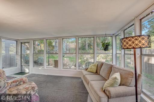 Back upstairs - the 3 season porch just beyond the dining area