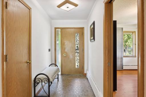 Step into the foyer, a magnificent entrance that sets the tone for the entire home.