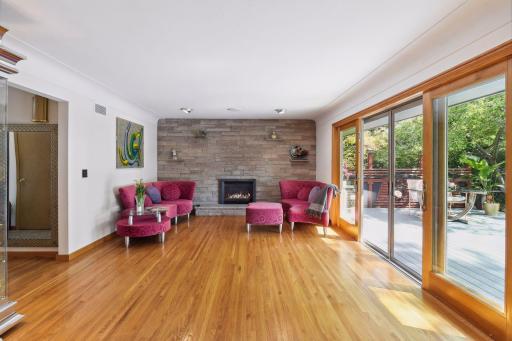 Step into the spacious living room with walls of windows, bathing the home in natural light. Welcome home!