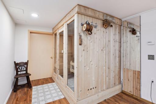 Relax and rejuvenate in the lower level's sauna room, complete with an electric 8 Kw heater.