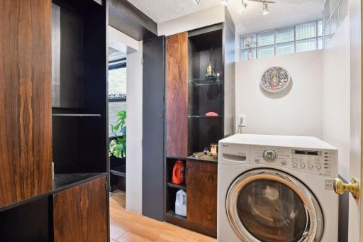 Effortlessly manage laundry with a convenient and functional lower-level laundry room.