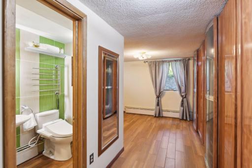 Lower level 4th bedroom has an en-suite bathroom.