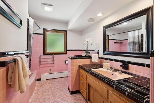 This full bathroom is designed to pamper and rejuvenate—your private oasis for relaxation.