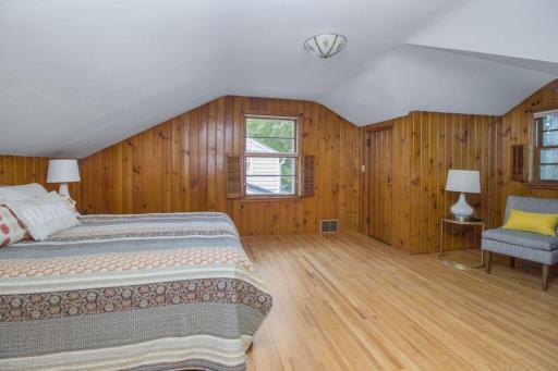 Large bedroom over the garage with treetop views