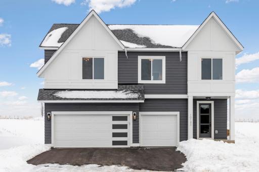 This home is anchored by a spacious foyer with split staircase – up to the main-level gathering room and down to a finished lower level family light-filled family room. The upper level includes three bedrooms, two baths, and laundry room.