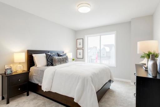 Bedroom #3 on the upper level is a great sized room with west facing windows to enjoy the Victoria sunsets!