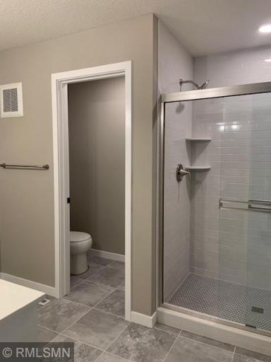 Photo for 16060 Eagleview Drive, Lakeville, MN 55044 - Listing #6434031 Ensuite with ceramic tile shower and private water closet.