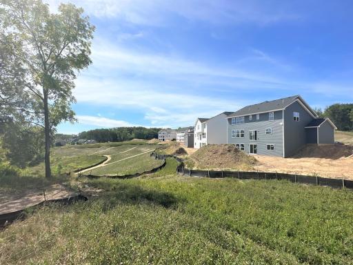 Natural beauty surrounds to complement this amazing home.