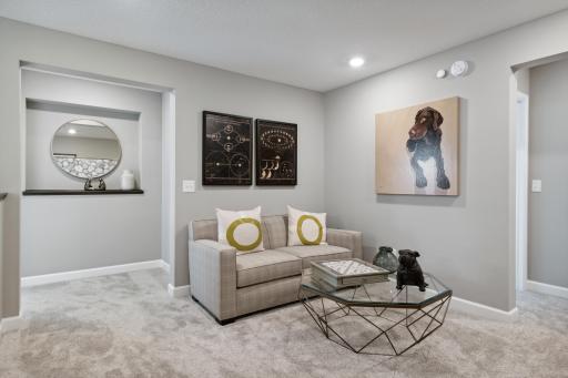 Upper level loft for alternate activities.