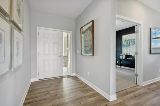 Front entry flanked with a front office or optional guest bedroom of your choice.