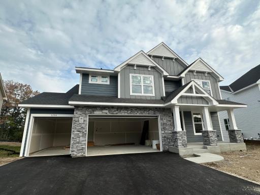 Stunning and beautiful but yet, not complete. Stone at garage and porch columns next!