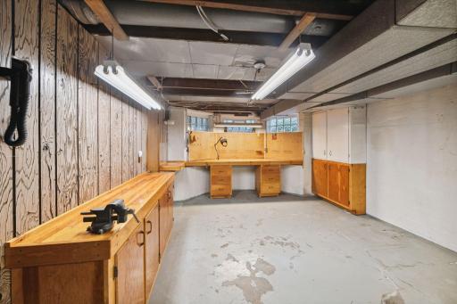 The basement is unfinished but has this great workshop space -- perfect for home projects or for the hobbyist.