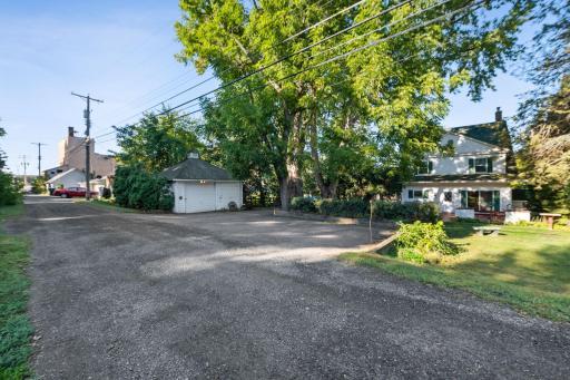 A view from the alley towards the house that shows the original carriage house.