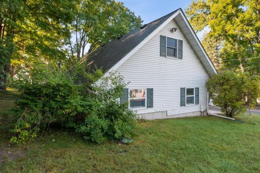 Side view of the garage that shows the end window in the unfinished upper level.