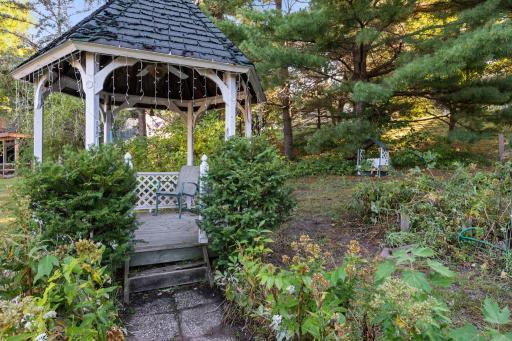 The gazebo in the back yard is a nice place to relax. The huge space allows for gardening and awaits bringing the landscaping and flowers back to their former glory.
