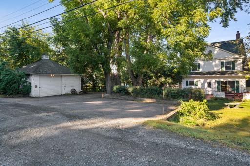 The carriage house can fit a small vehicle or is also ideal for storing all of the yard equipment.