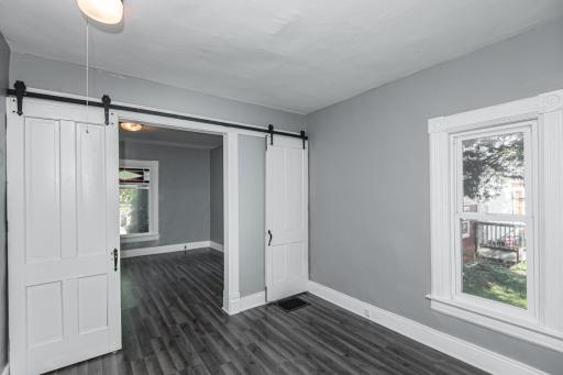 Photo for 305 S Section Avenue, Spring Valley, MN 55975 - Listing #6435441 Main floor bedroom with original home barn doors