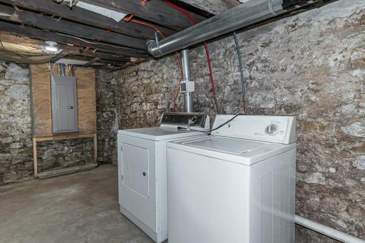Photo for 305 S Section Avenue, Spring Valley, MN 55975 - Listing #6435441 Very clean, dry basement with newly redone wide stairs to the washer/dryer. Access from 1/2 bath in main floor bedroom