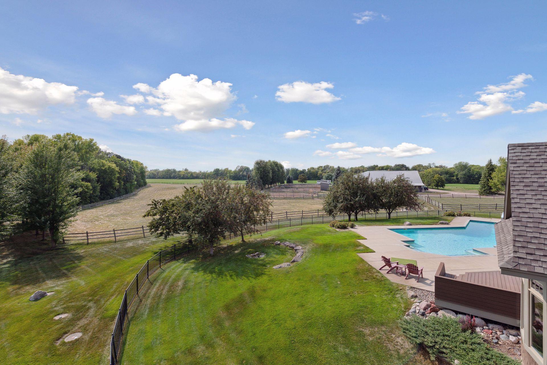 View from the upper-level balcony out over the property