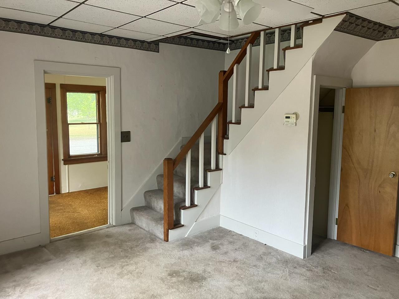 Beautiful stairs up to the upper level bedrooms.