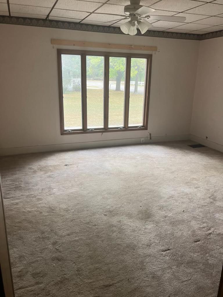 Spacious living room with huge window