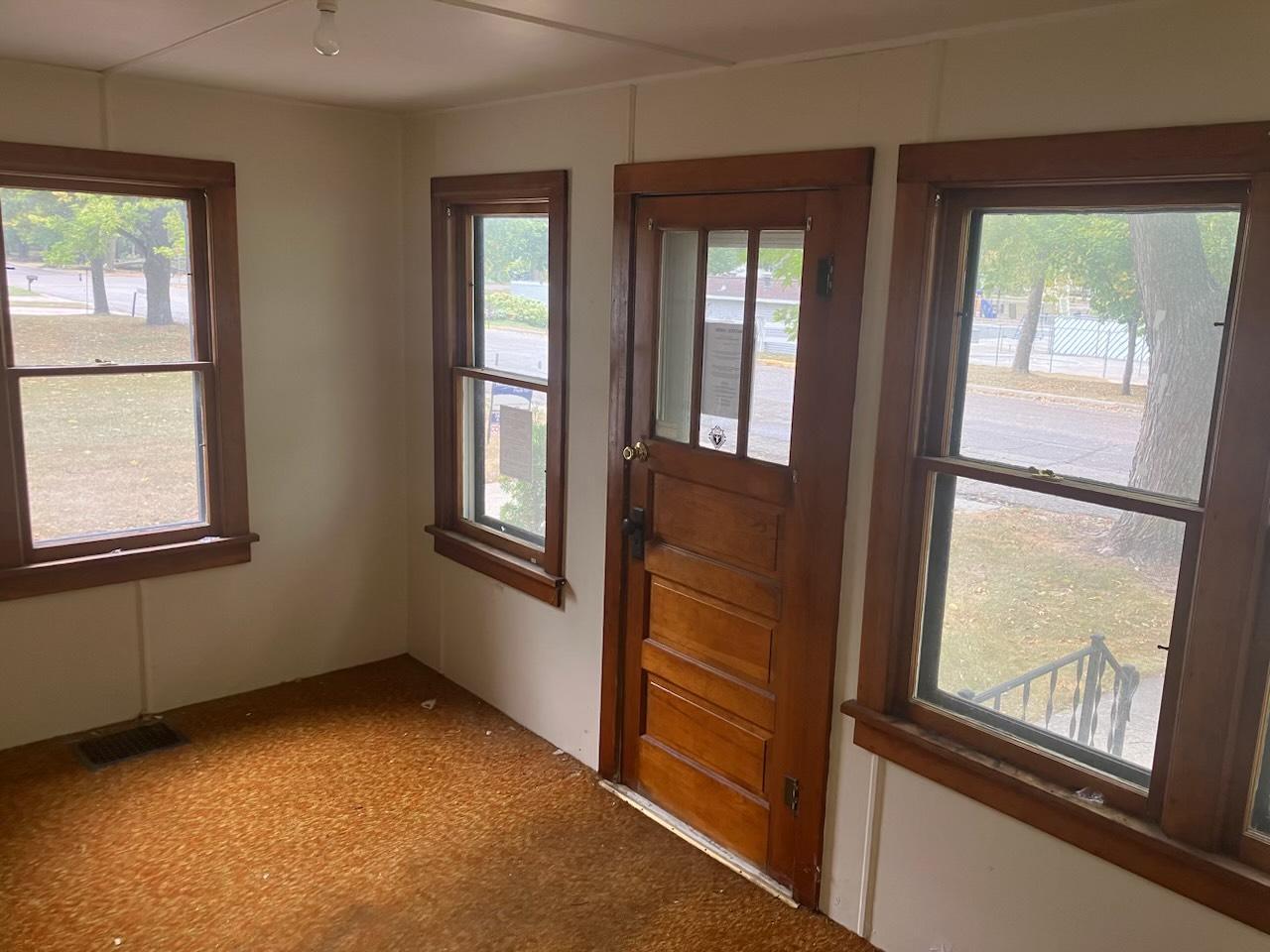 Step into your new home and enjoy visiting with guests on the porch!