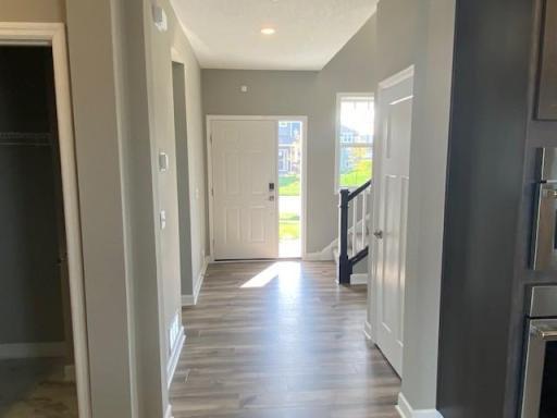 Make the best first impression with this bright and open foyer. Thoughtfully-designed to leave plenty of room for your guests to arrive and feel comfortable. (Photo of completed home, actual home finishes may vary slightly)