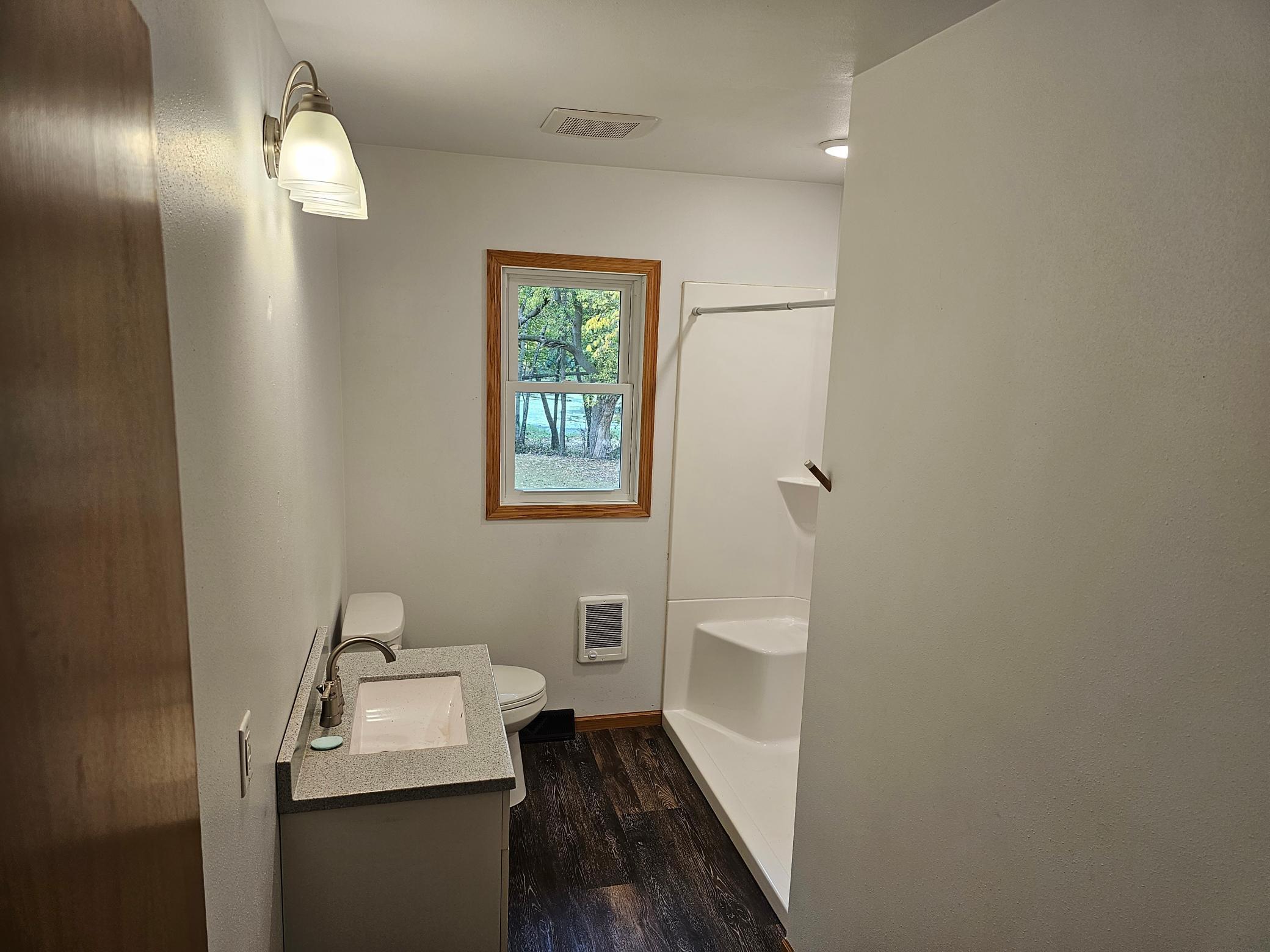 Walk in Shower in updated bath.