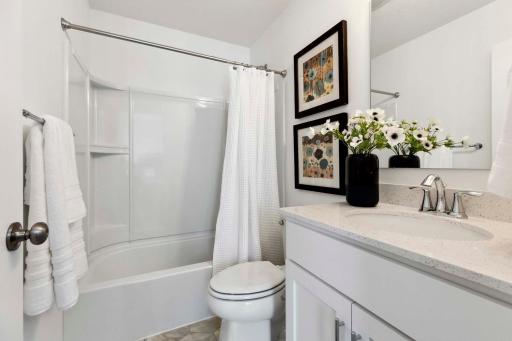 En Suite Bath with Custom Cabinets, Quartz Counters & Shower/Tub Surround