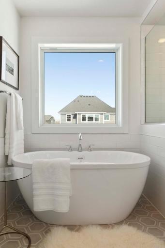 Freestanding Tub Complete with Tile Surround and Picture Window
