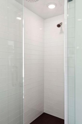 Ceramic Floor, Walls and Ceiling in this Large Walk In Shower - Complete with a Rain Shower Head!