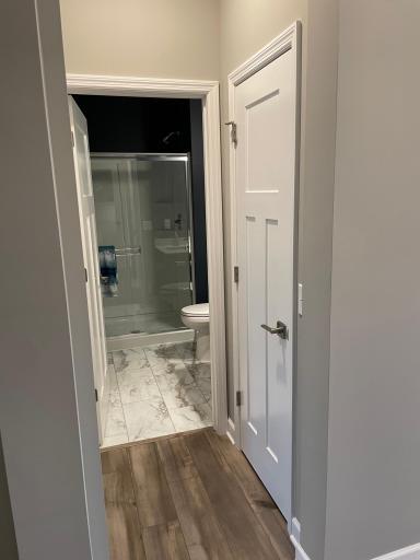 The main level bathroom is conveniently located right next to the guest suite.