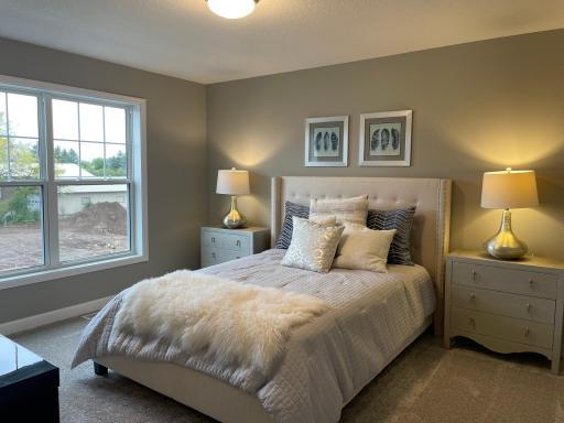 All secondary bedrooms feature a walk-in closet and are nicely sized with generous use of windows.