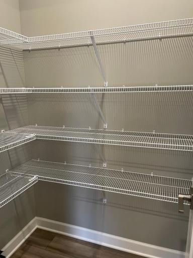 Finally, a pantry large enough to stay organized. Enjoy this walk-in pantry conveniently positioned in the corner of the kitchen.