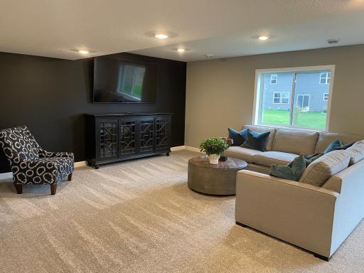 This finished basement is great for entertaining guests or for movie night.