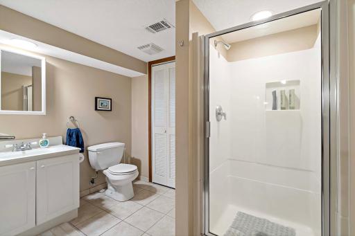 Lower level 3/4 bathroom offers plenty of space.