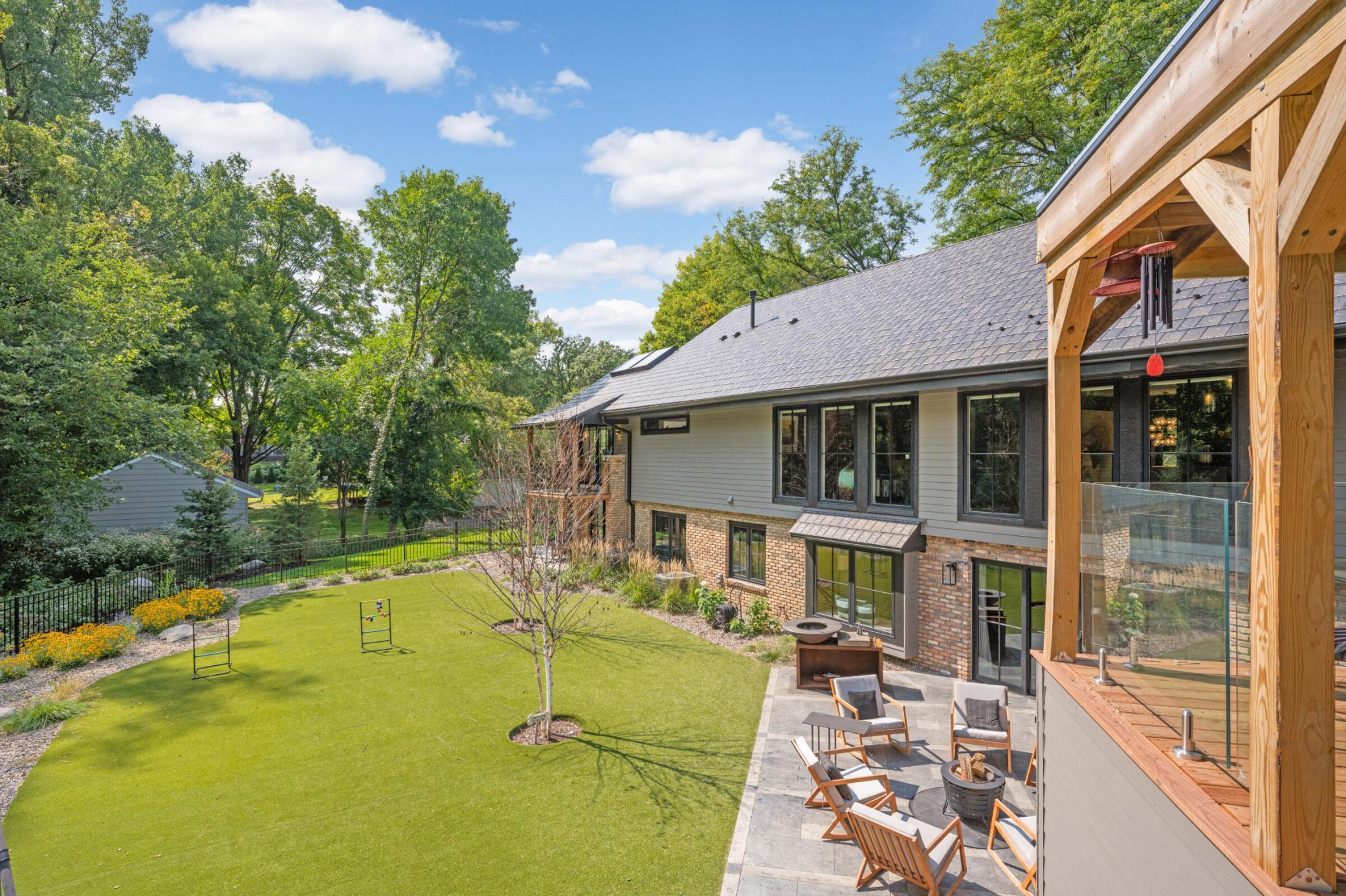 Private fenced-in backyard with K9 grass