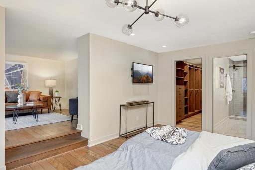 Two ground level bedrooms set up as guest ensuite with walk-in closet and built ins