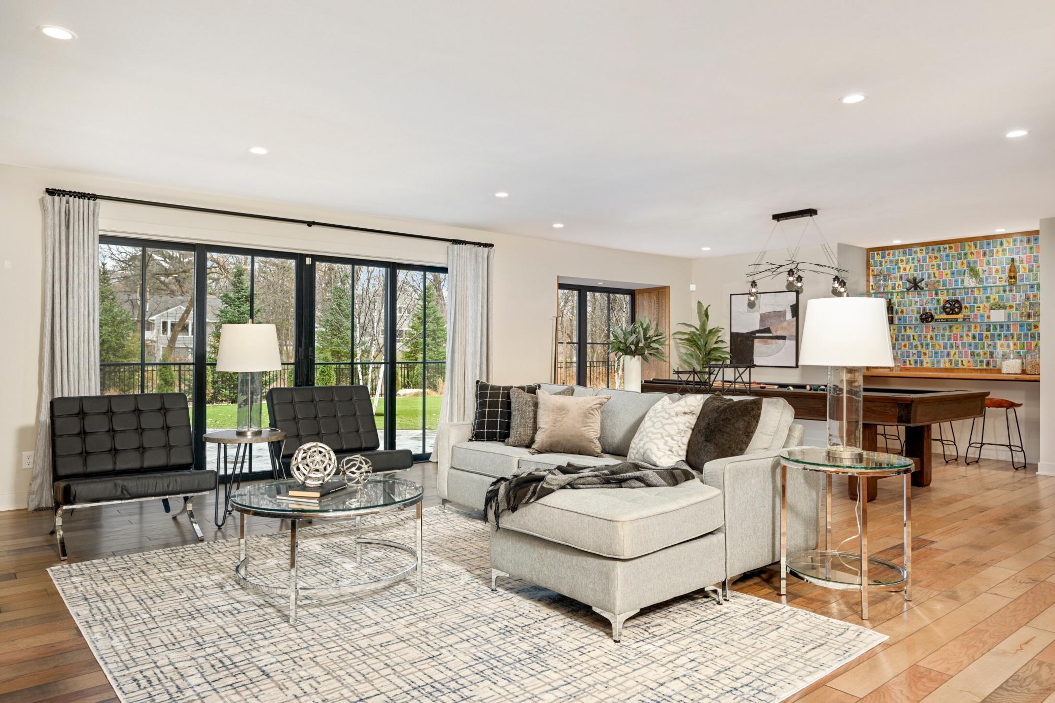 Ground level walk out to private fenced-in backyard with patio.