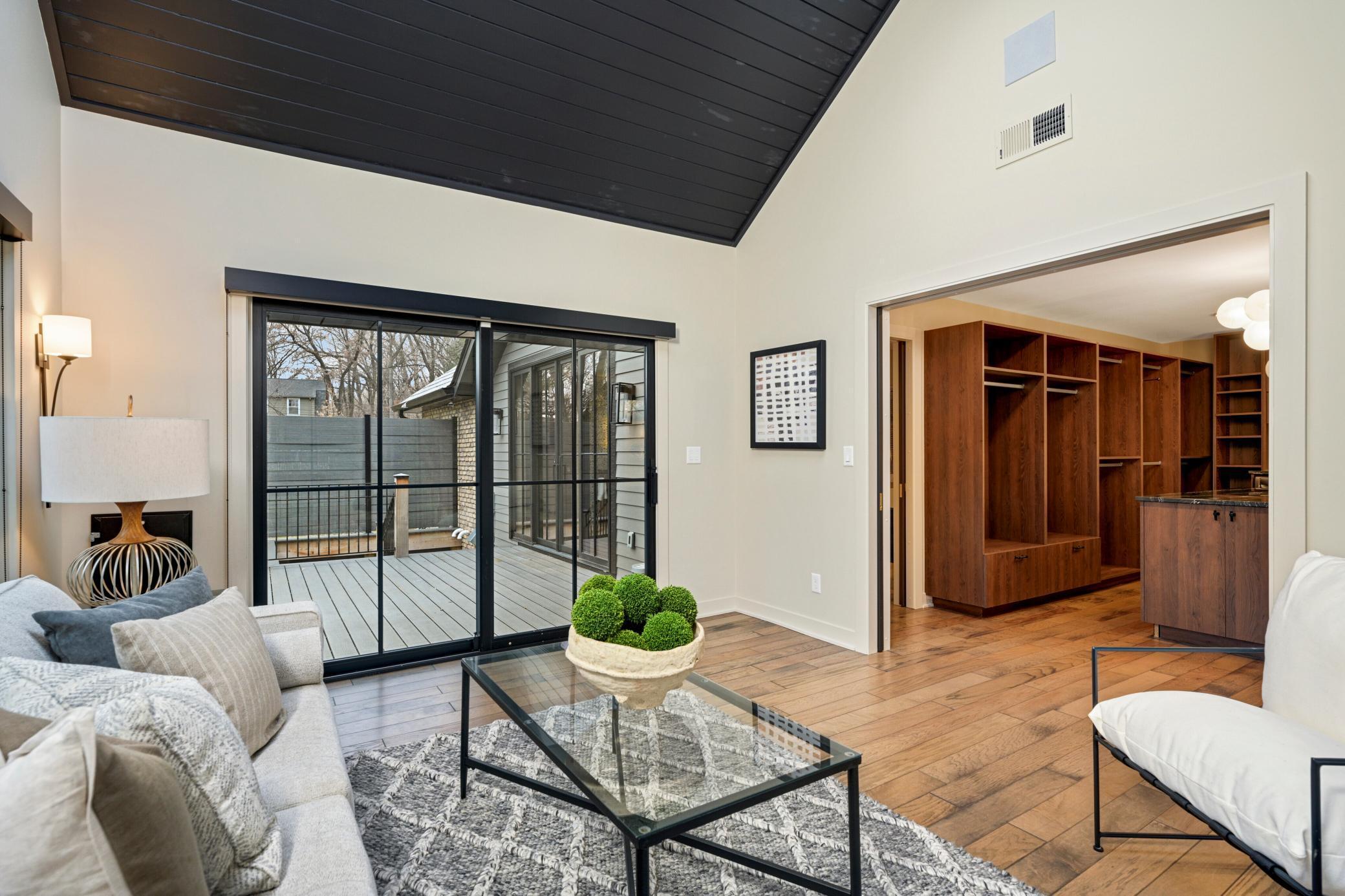 Seating room walk out to the private spa deck