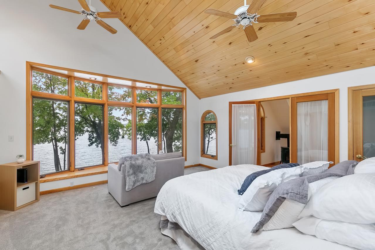 Primary bedroom looking at the lake