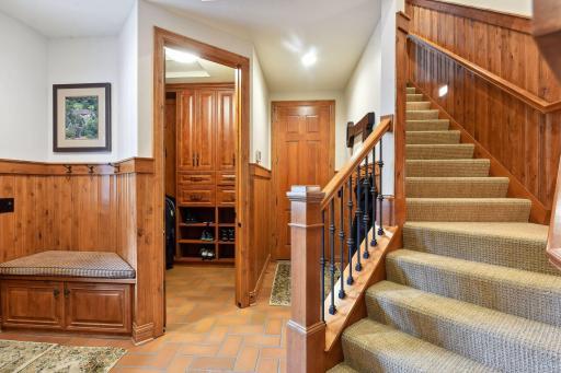 Mudroom closet and back staircase to bonus room