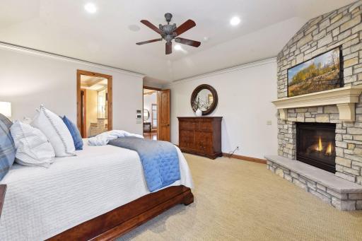 Main floor primary suite with gas fireplace.