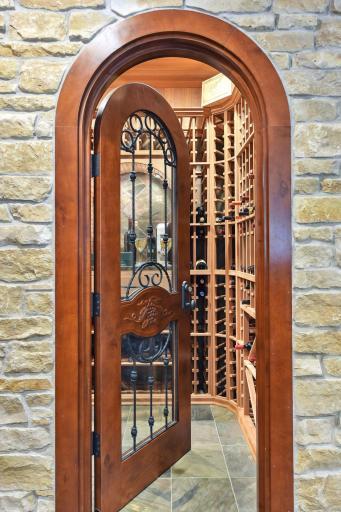 Expansive wine room with various bottle storage.