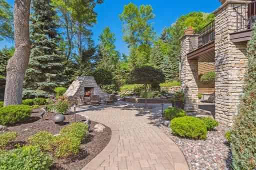 Lovely patio space with outdoor frieplace.