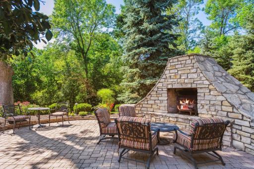 Outdoor fireplace on patio space.