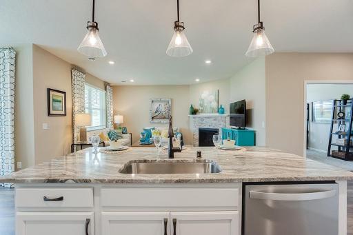 Fantastic sight from your kitchen island to the living room for watching TV or hosting friends and family.